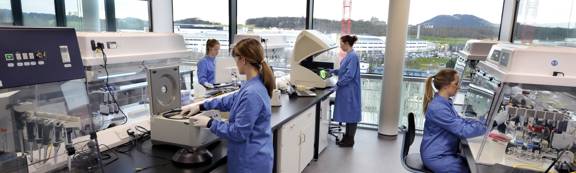 Four Scientists In Lab